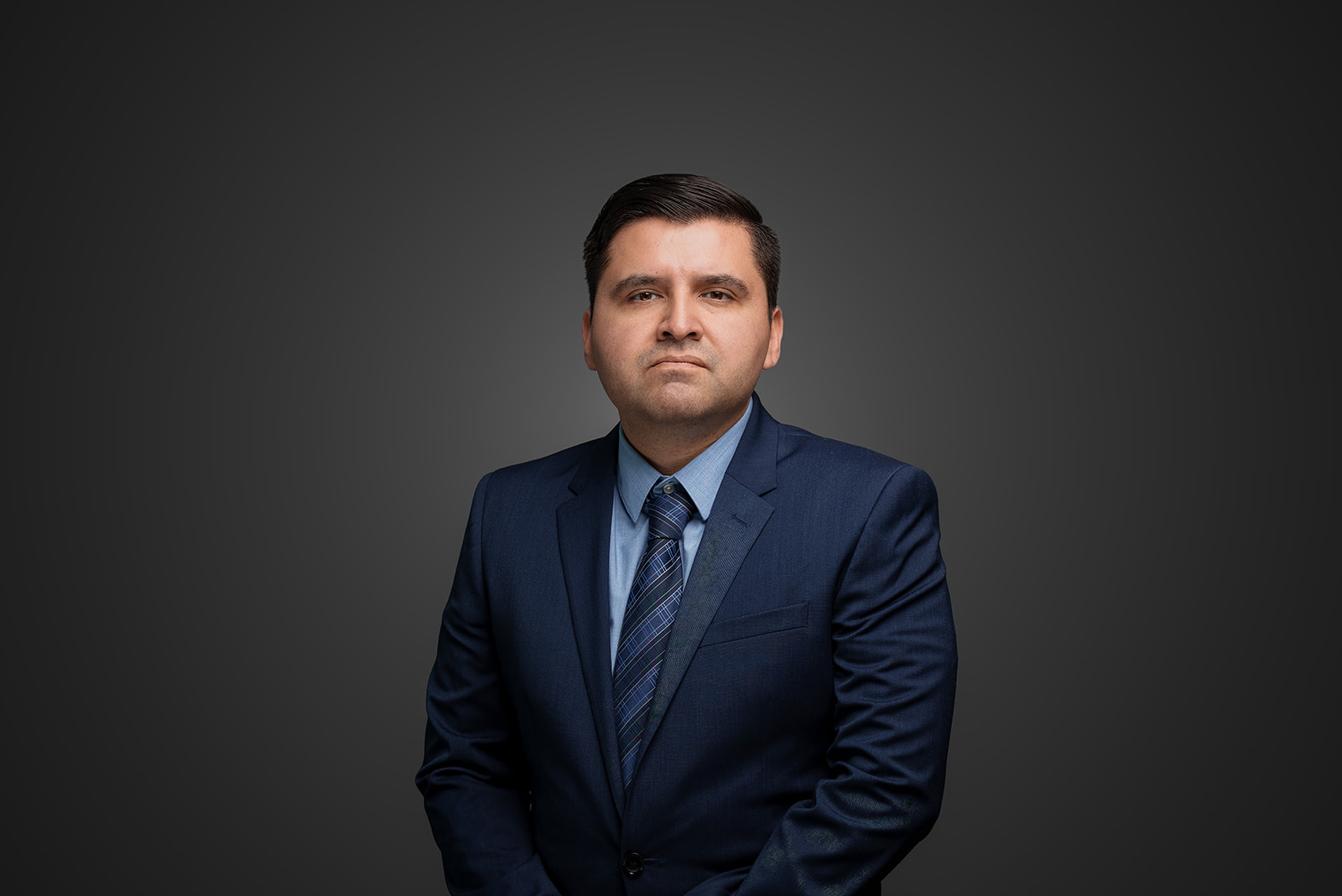 Professional Cintas employee portrait in a blue suit